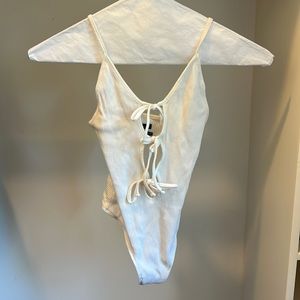 White bodysuit with holes